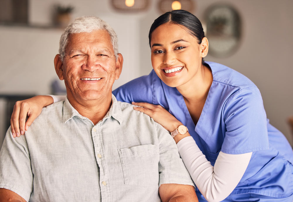 Elderly man with caregiver